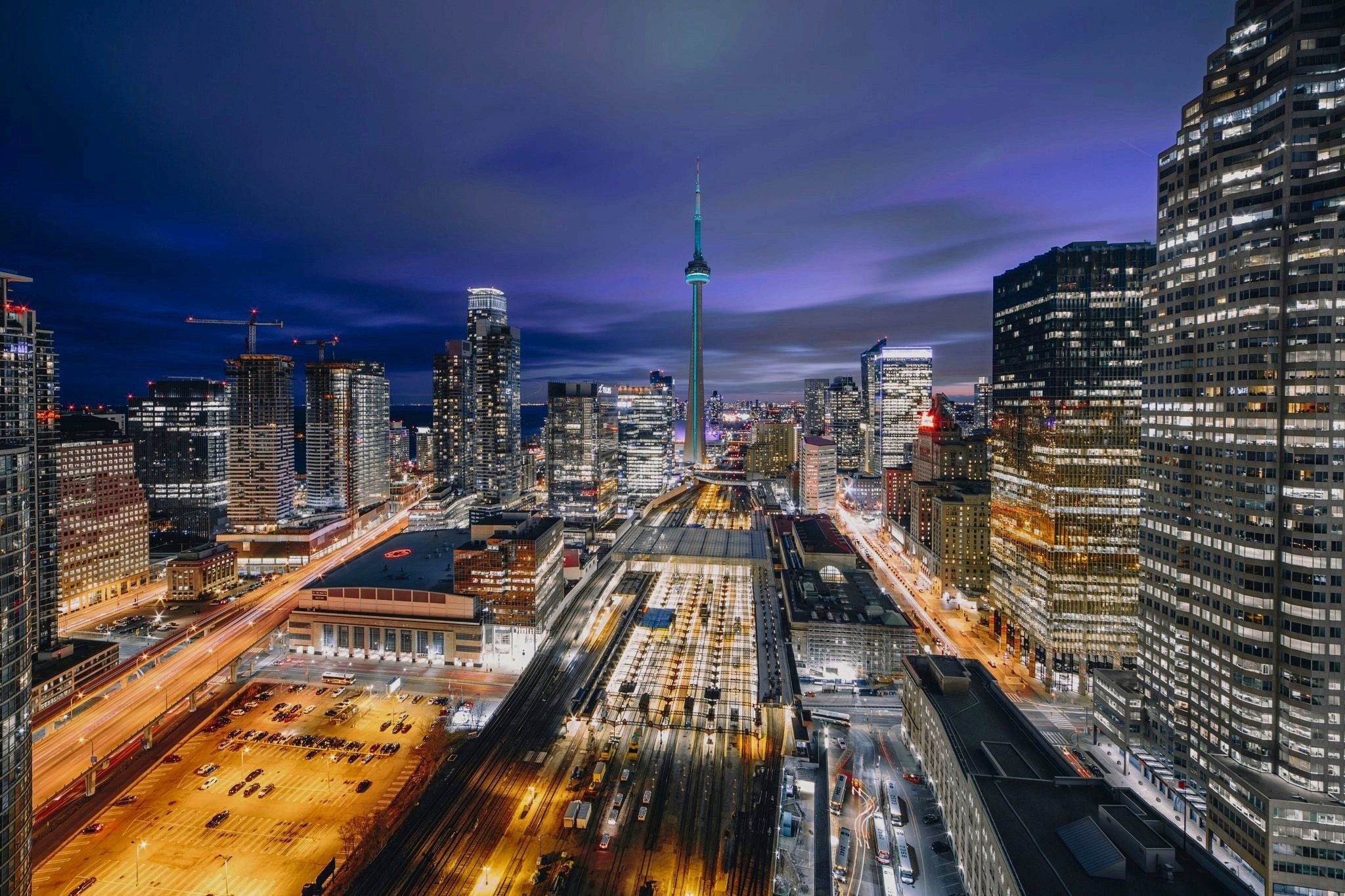 Toronto skyline at night for Axu ride-hailing service
